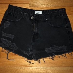 Distressed black denim shorts
